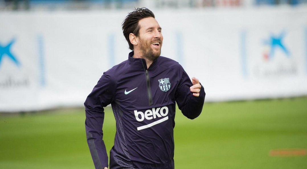 Lionel Messi returns to Barcelona for training