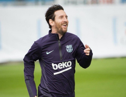 Lionel Messi returns to Barcelona for training